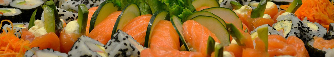 Eating Japanese Sushi at Tsunami Restaurant & Sushi Bar - Union Heights restaurant in Midvale, UT.